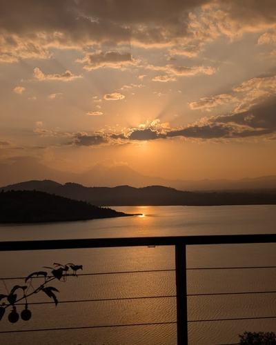 Sunset over Lake Kivu from the terrace — Volcano Peaks Safaris Rwanda guests