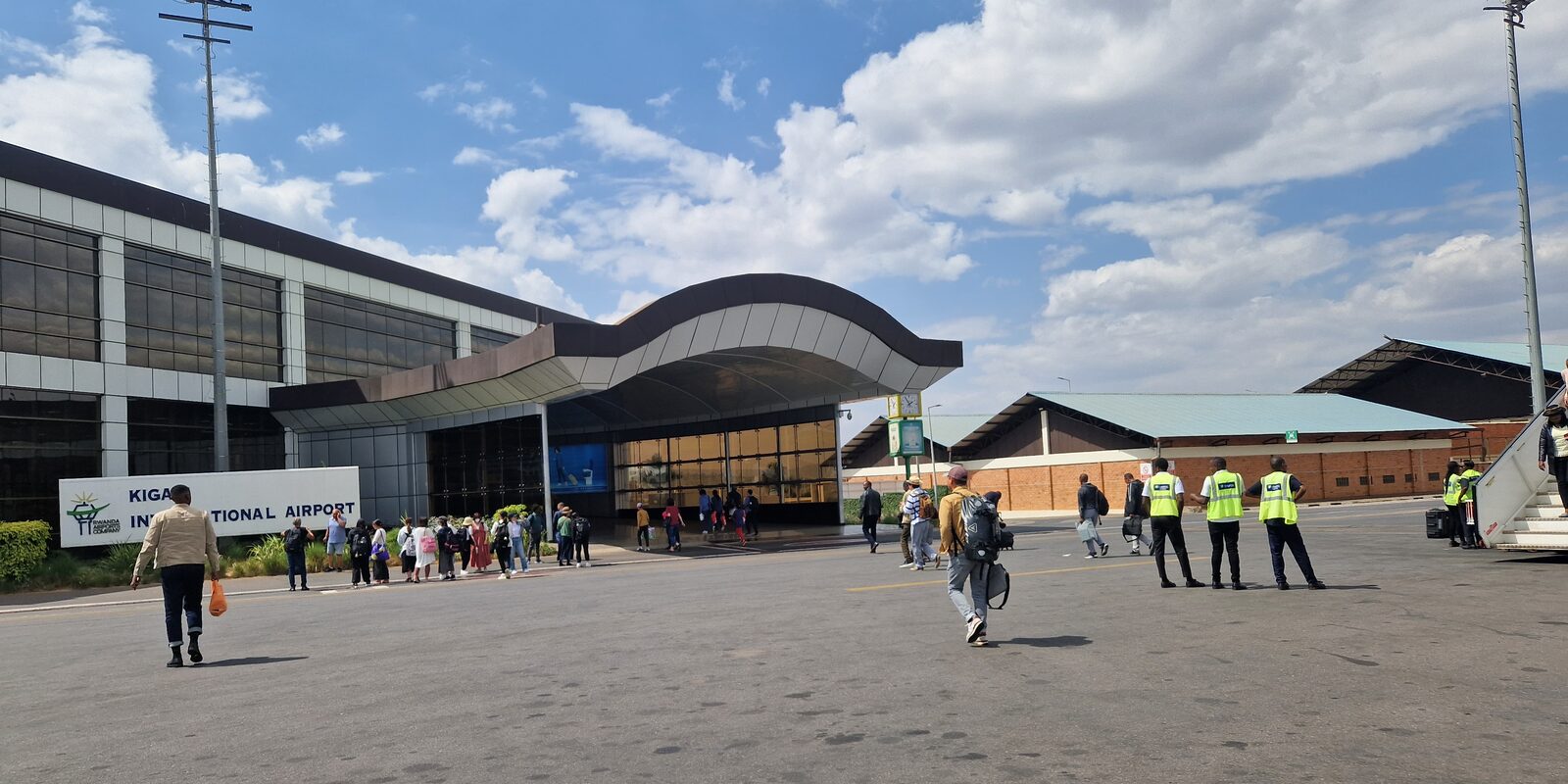 Passengers walking to the terminal entrance at Kigali International Airport